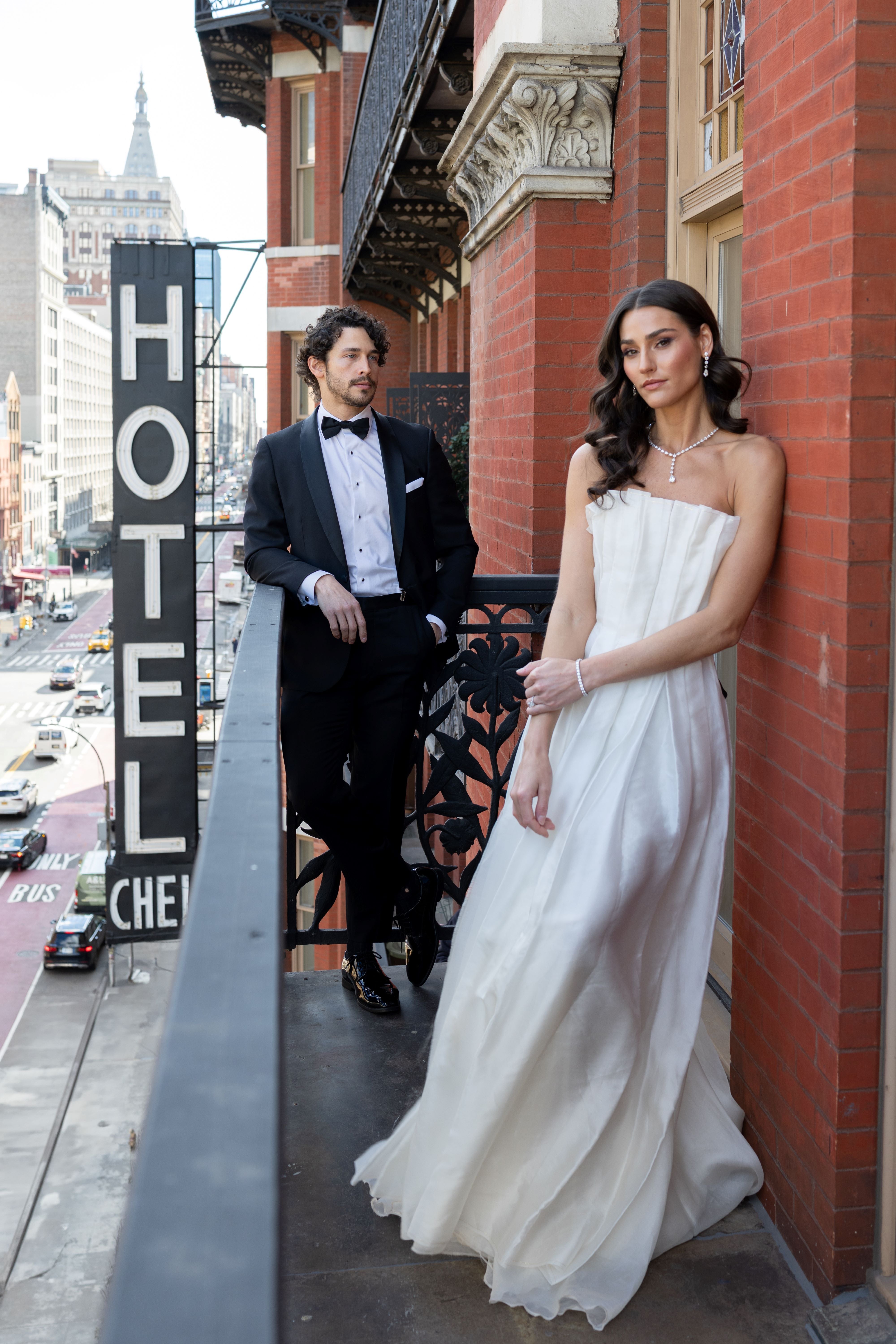 Graduated Round Diamonds and Pear Dangling Earrings