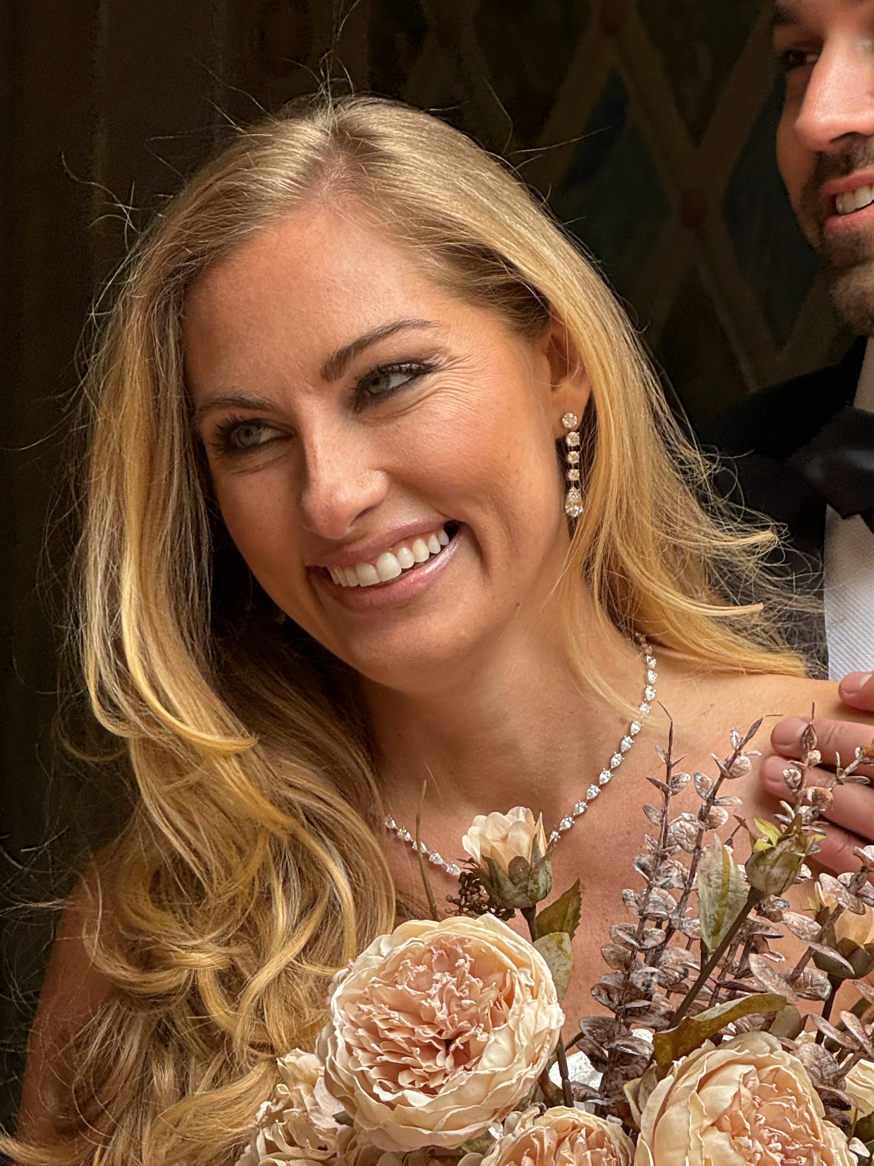 Graduated Round Diamonds and Pear Dangling Earrings