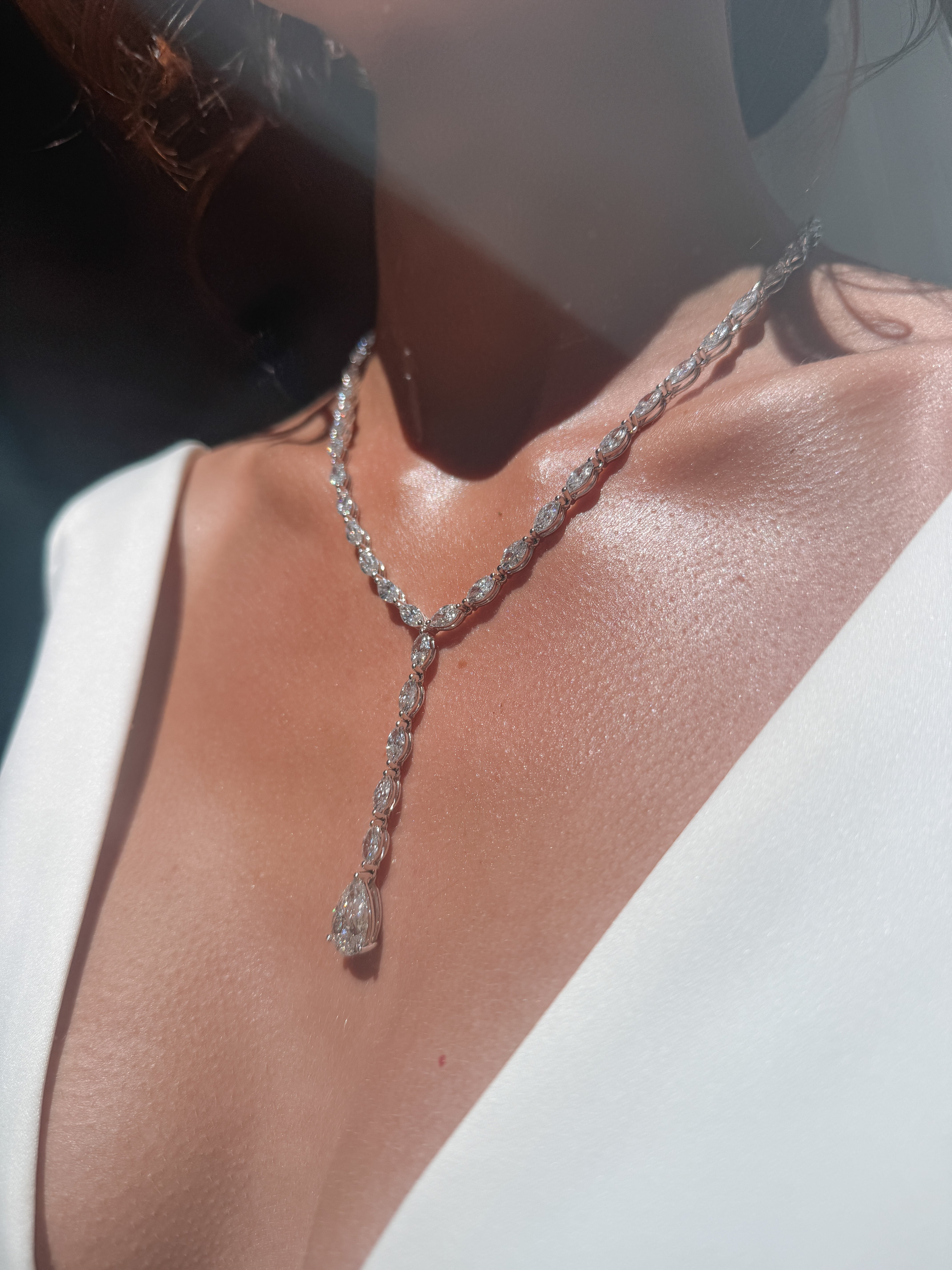 Marquise and Pear Diamonds Lariat Necklace  (31.29 Ct. Tw.) for Sale