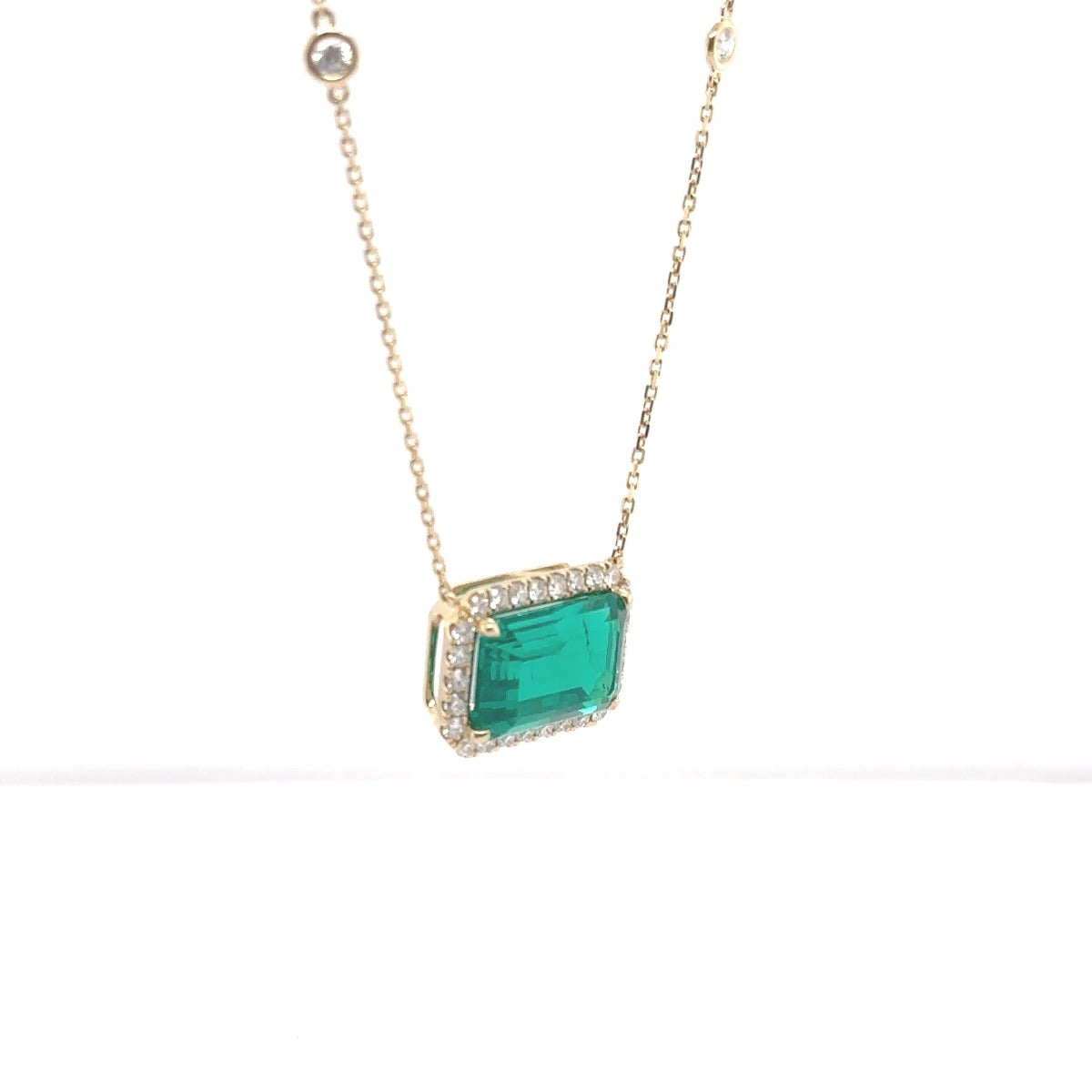 Yellow Gold Green Emerald Halo Necklace - Elgrissy Diamonds