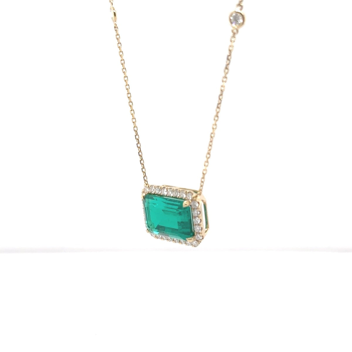 Yellow Gold Green Emerald Halo Necklace - Elgrissy Diamonds