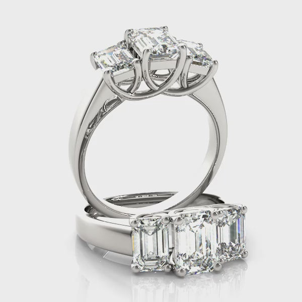 Three stones Emerald Cut Engagement Ring