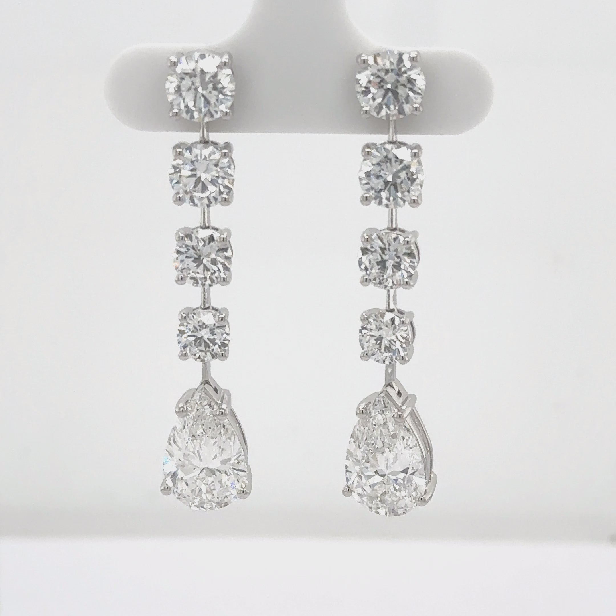 Graduated Round and Pear Diamond Earrings