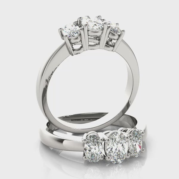 Three Stones Oval Tapered Engagement Ring
